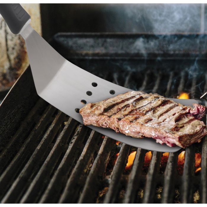 Burger Turner lifting meat off a grill