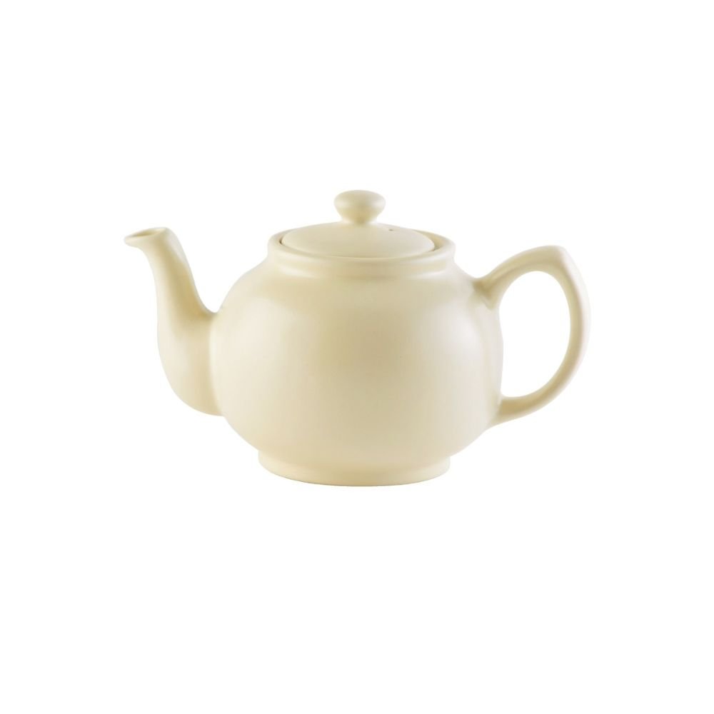 cream colored teapot on a white background.