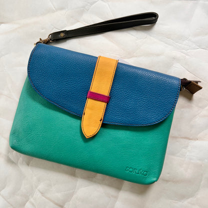 saddle bag with wristlet attached.