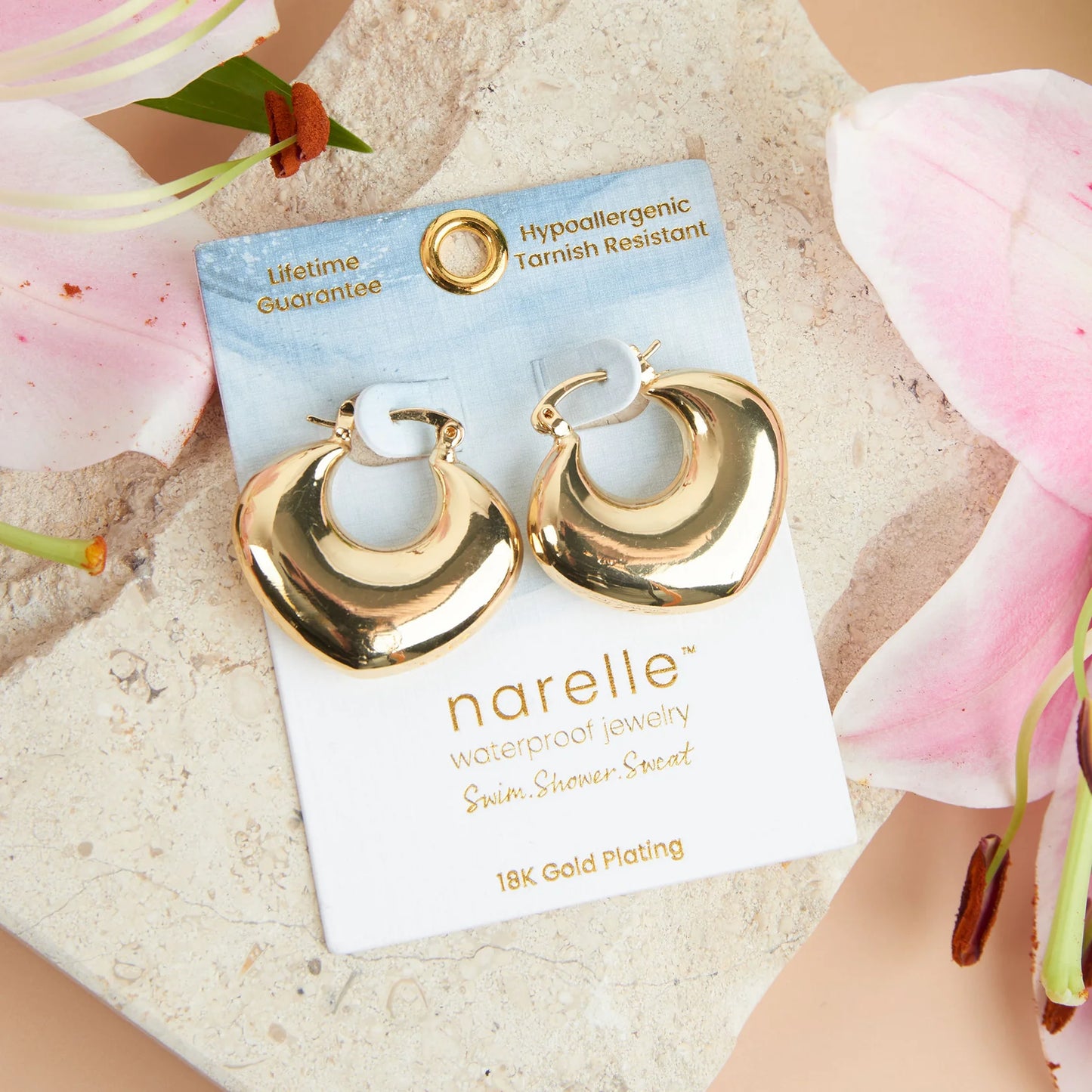 gold Narelle Waterproof Round Geo Hoop Earrings on their card packaging