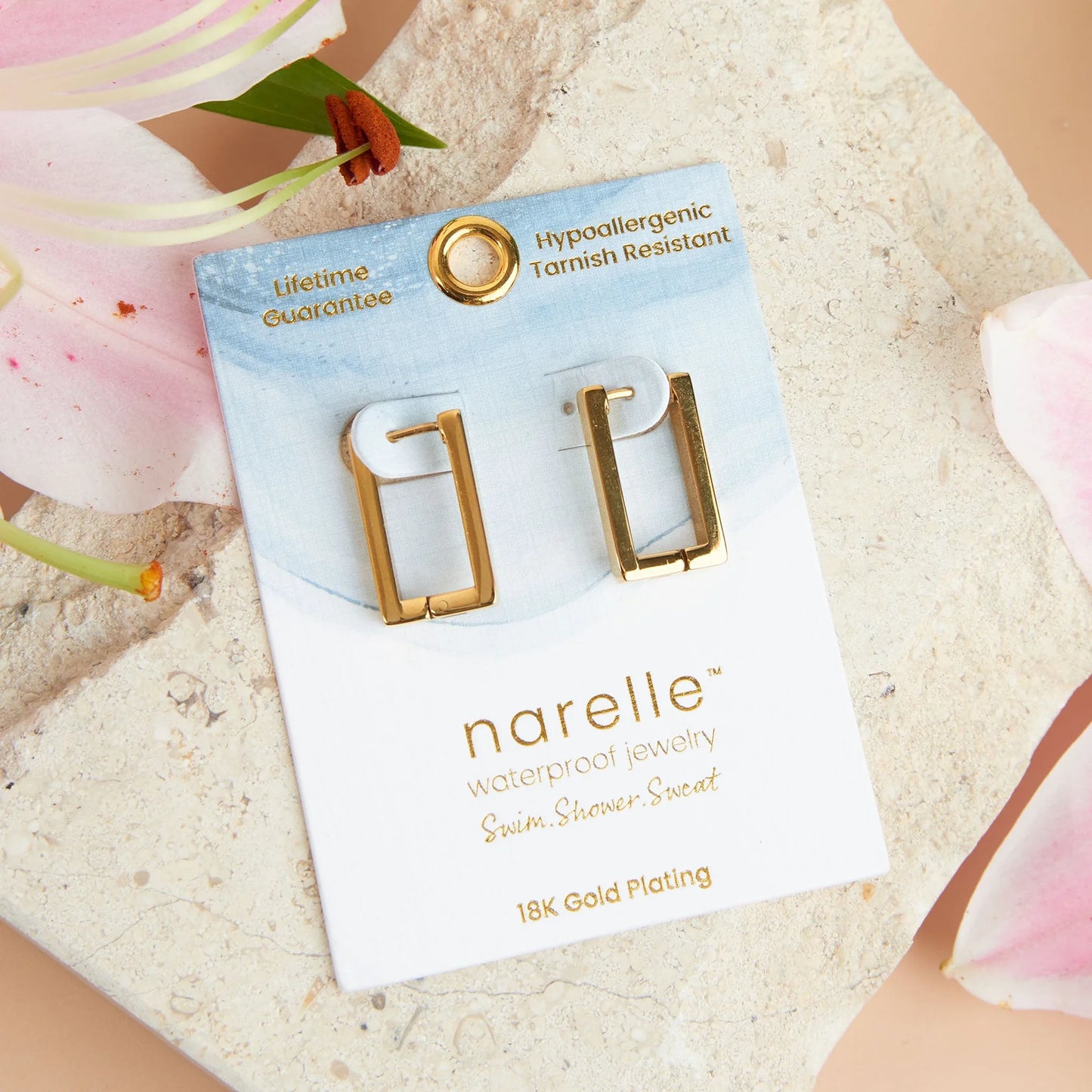 gold Narelle Waterproof Rectangle Hoop Earrings on their card packaging