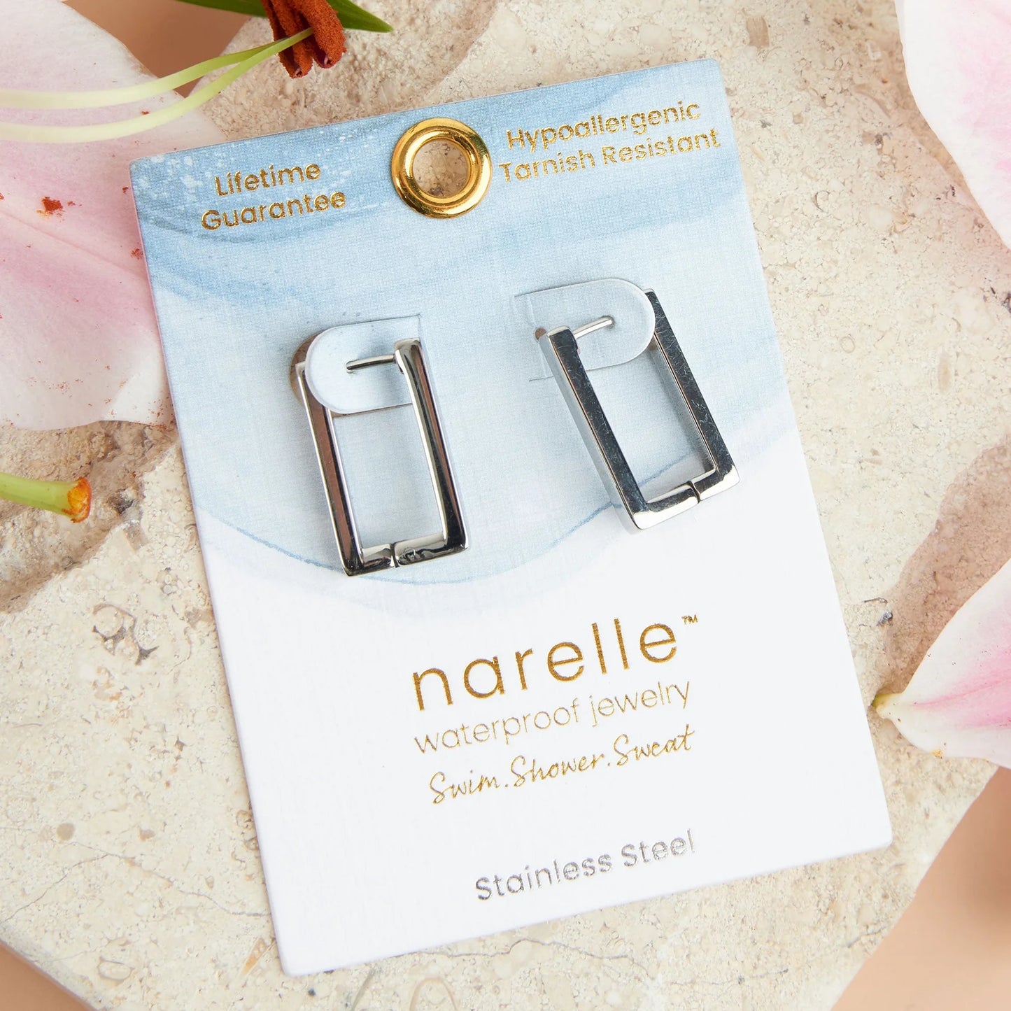 silver Narelle Waterproof Rectangle Hoop Earrings on their card packaging