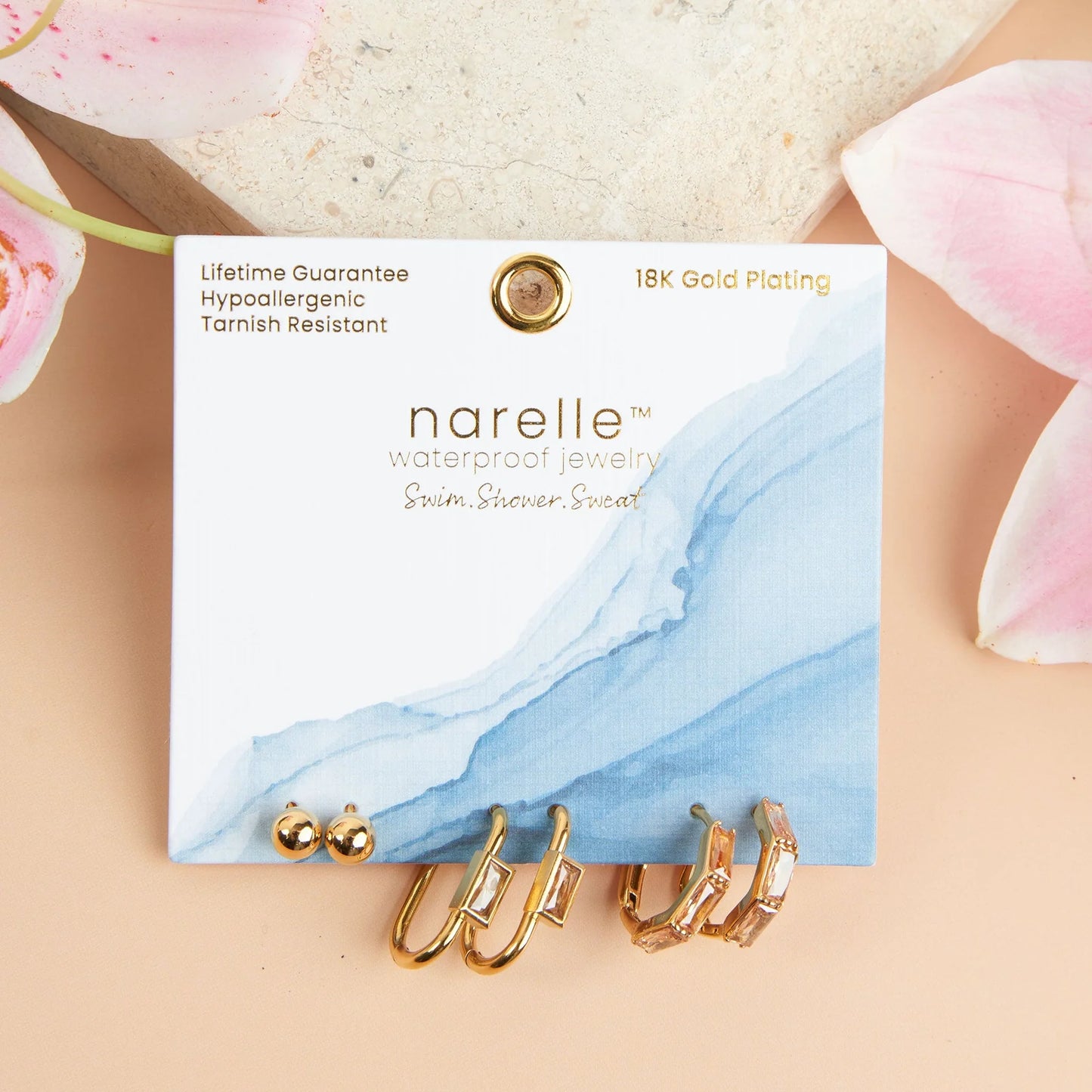 gold Narelle Waterproof Rectangle Hoop Earring Trio on their card packaging