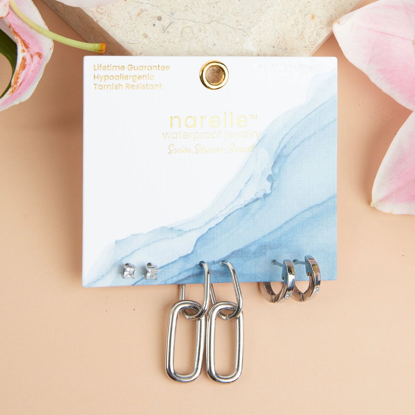 silver Waterproof Double Linked Hoop Earring Trio on its card packaging