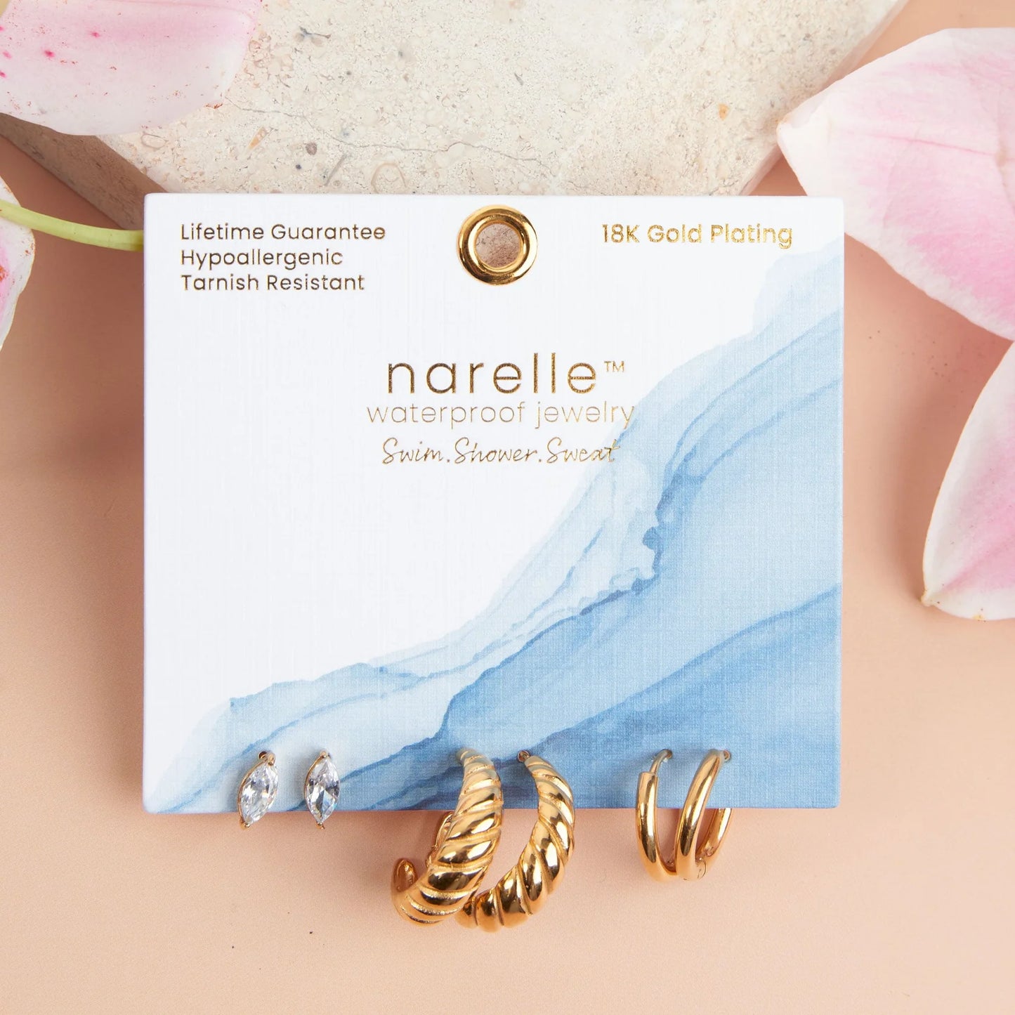 gold Waterproof Half Moon Hoop Earring Trio on their card packaging