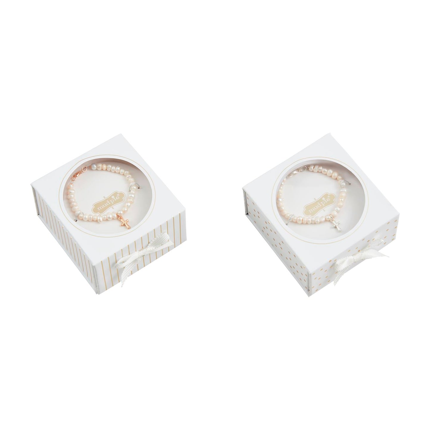 Two white gift boxes with cross bracelets inside