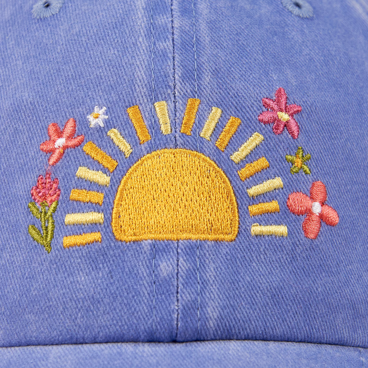close-up of sun and flower embroidery