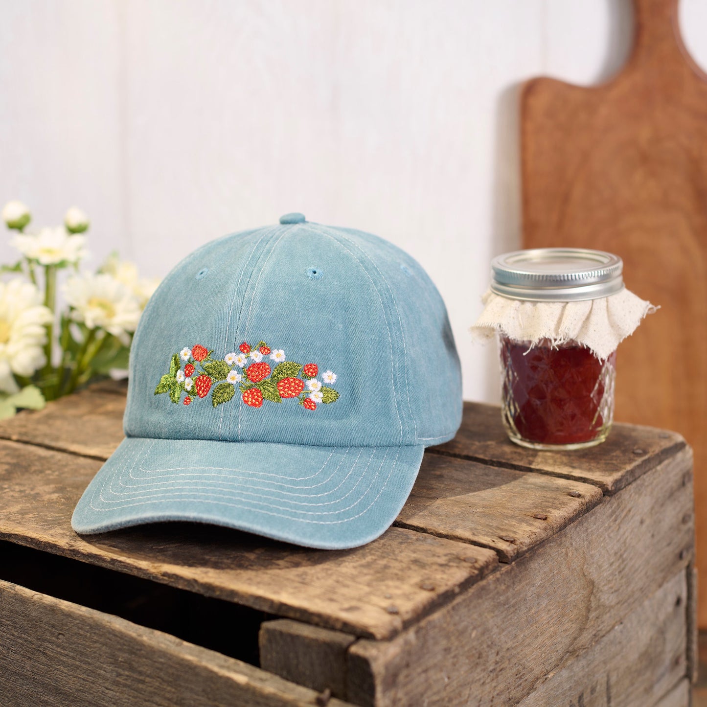 sweet strawberry hat in a decorated setting
