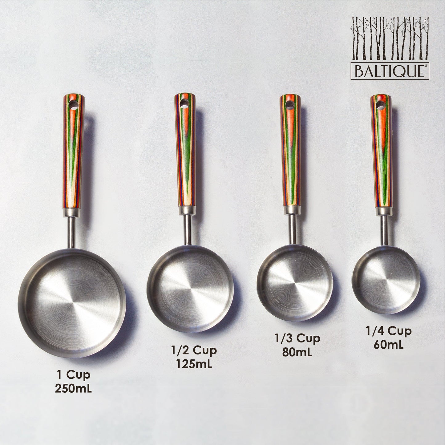4 sizes of marrakesh measuring cups arranged on a white surface with the measurements labled.