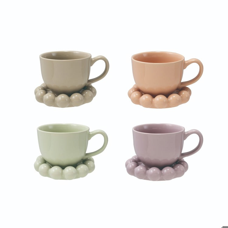 4 colors of sage green Stoneware Mugs with Bubble Saucers shown on a white background