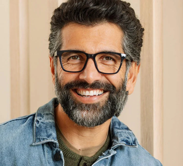 person wearing wilder glasses in navy