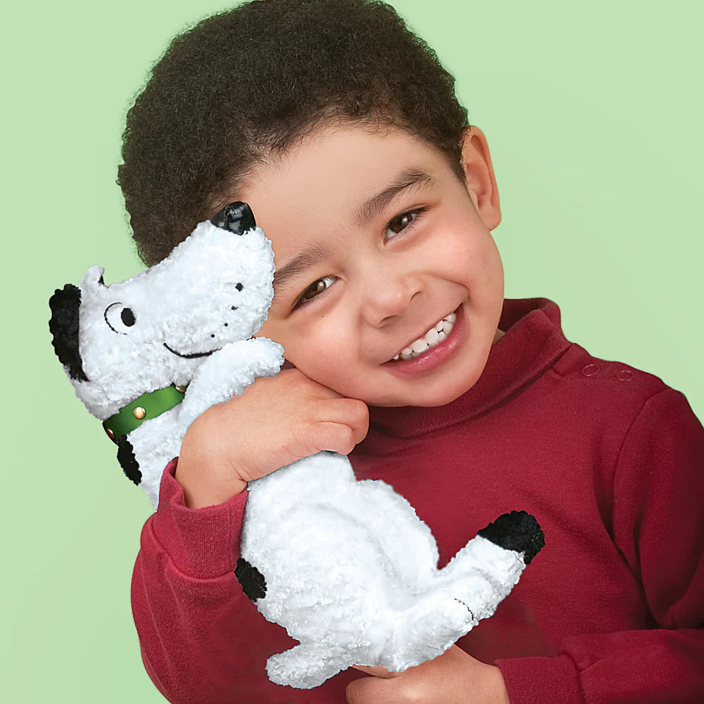 happy child hugging Harry the Dirty Dog Plush Toy