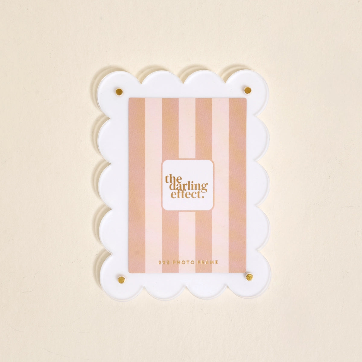 Scalloped white magnetic frame on a white background.