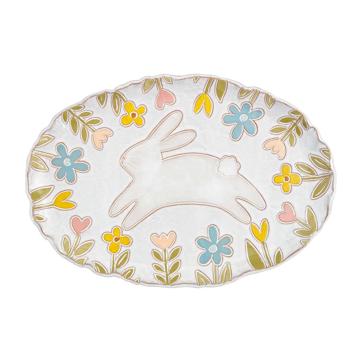 white oval platter with bunny and floral pattern.