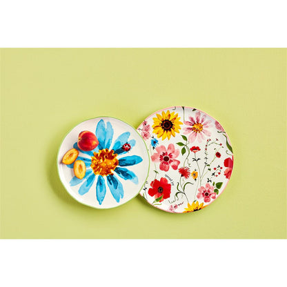 2 round platters with floral designs on a light green background.