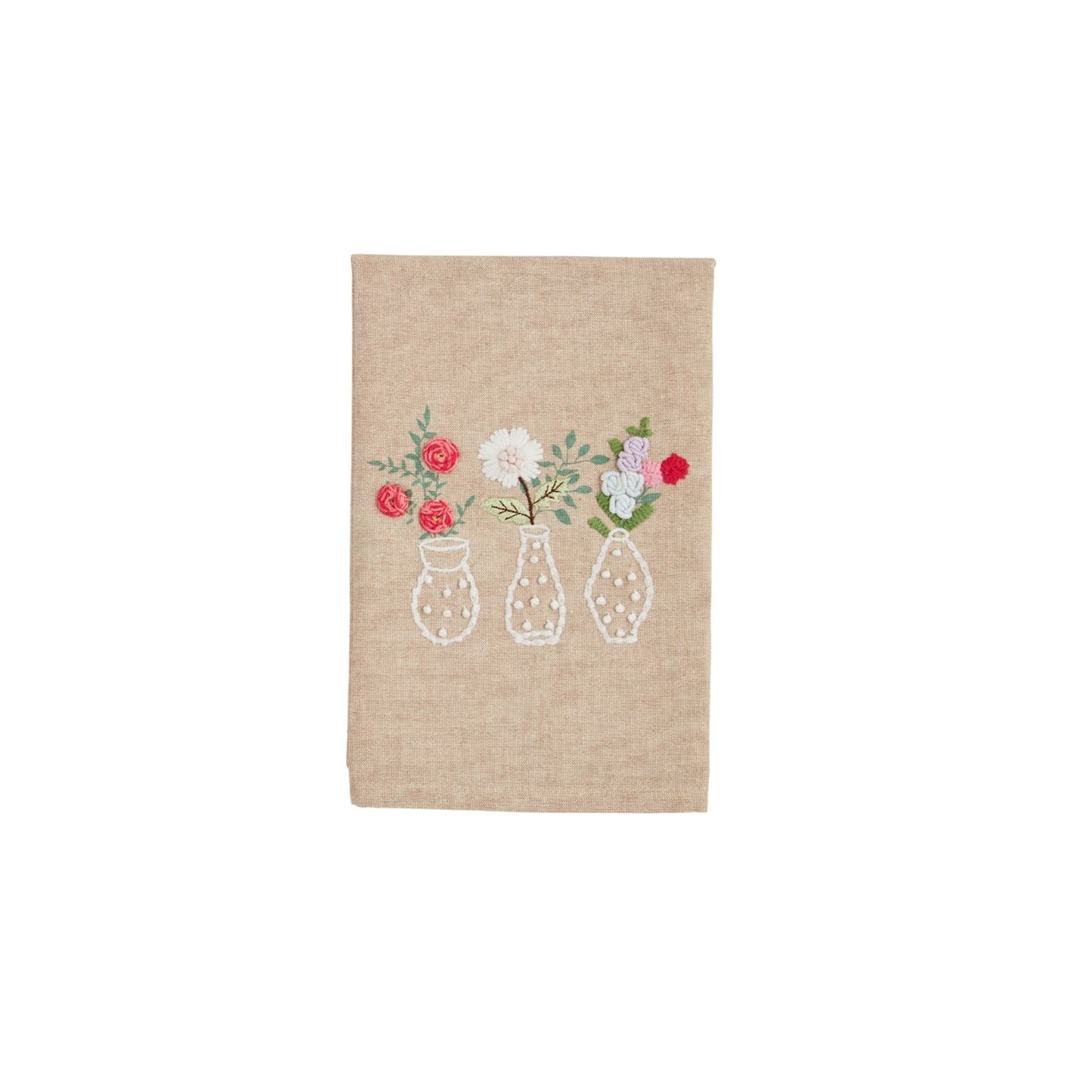 Beige towel with embroidered design of three vases with flowers in them shown on a white background