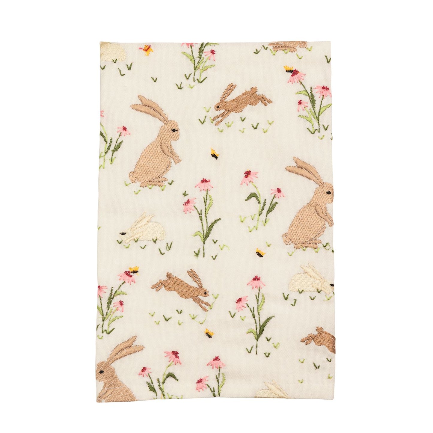 cream towel with floral and bunny pattern on it