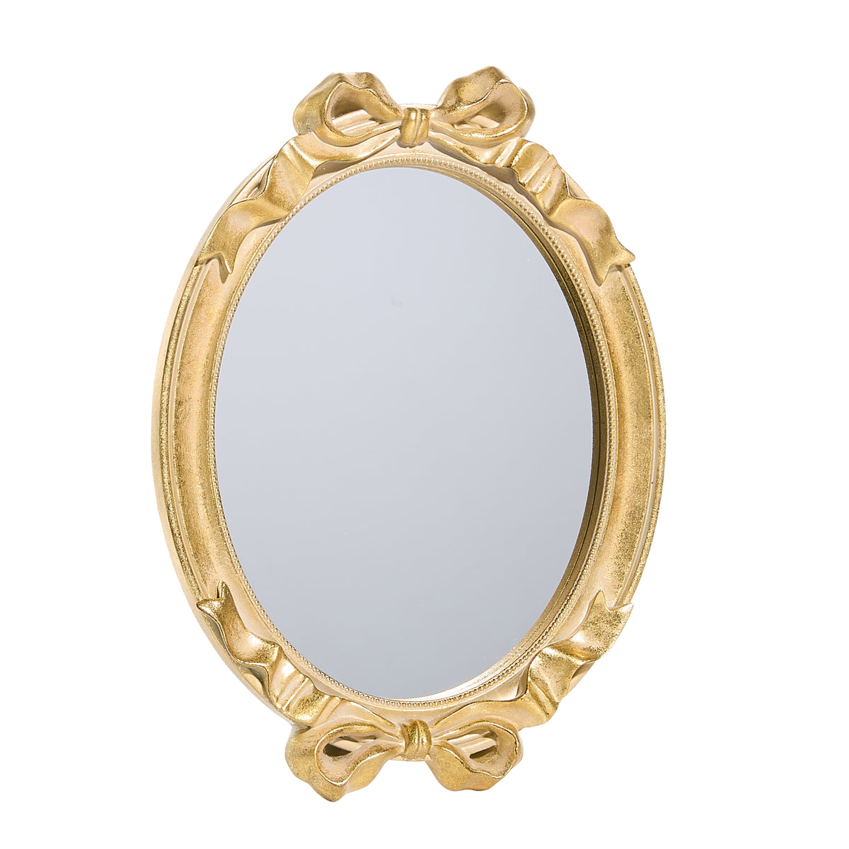 gold framed oval mirror with bows on the top and bottom of mirror
