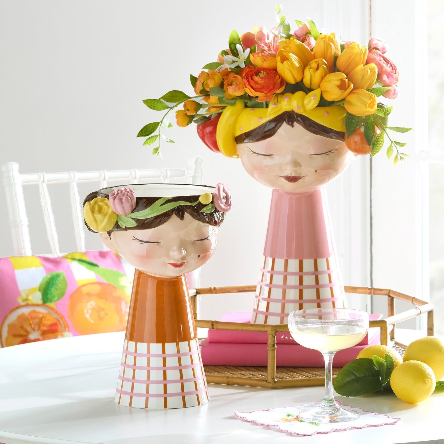 girl head ceramic vase in a decorated setting
