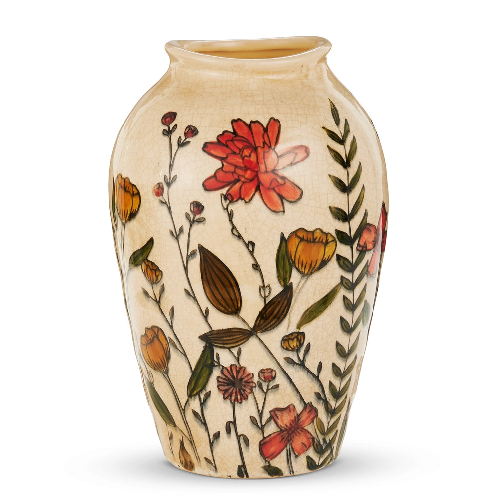 tall cream vase with warm green, yellow, and orange florals on it