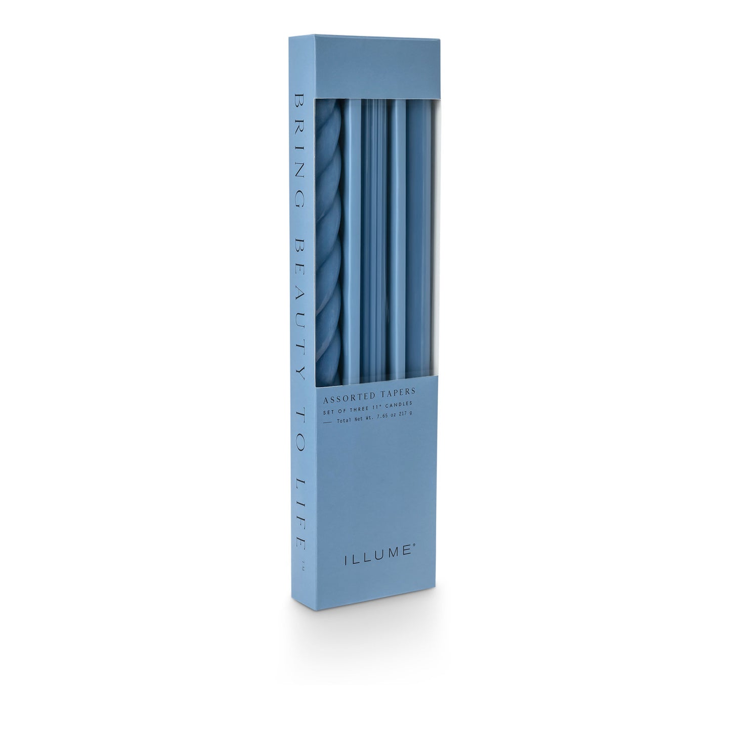 three assorted blue taper candles in their packaging