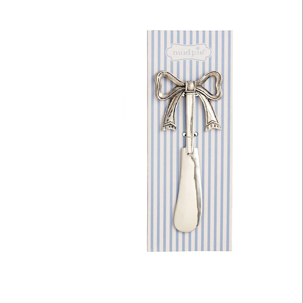 spreader with bow handle tied on a blue stripe card