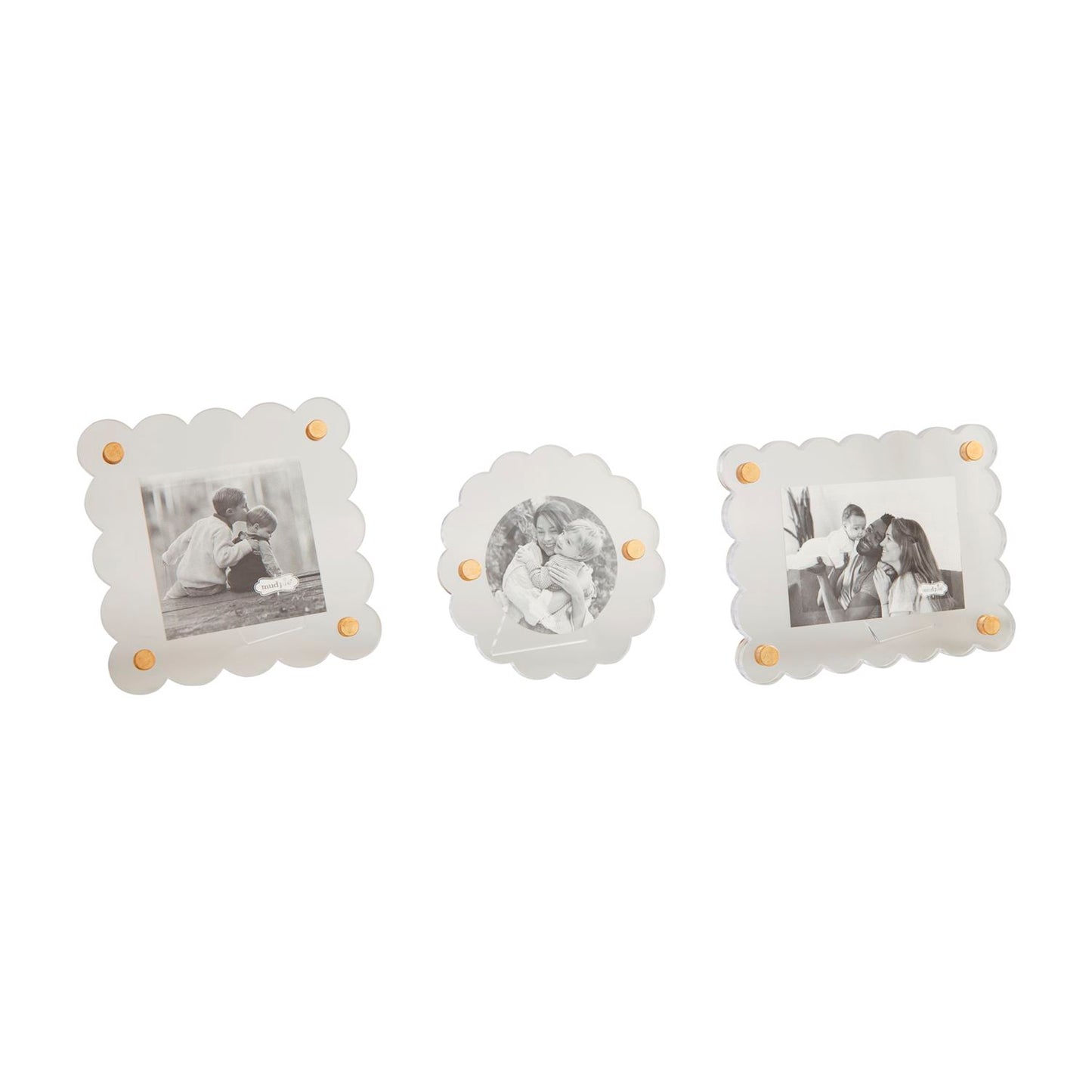 3 assorted acrylic photo frames in a row on a white background