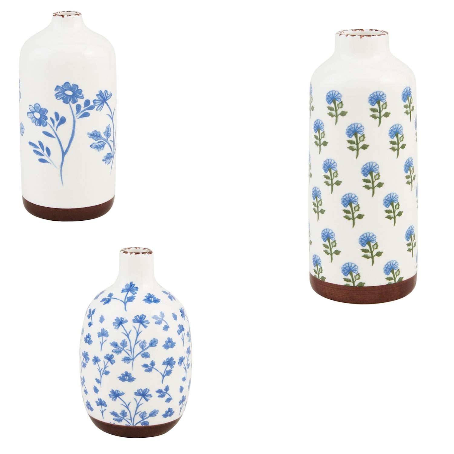 3 sizes and style of blue floral vases on a white background.