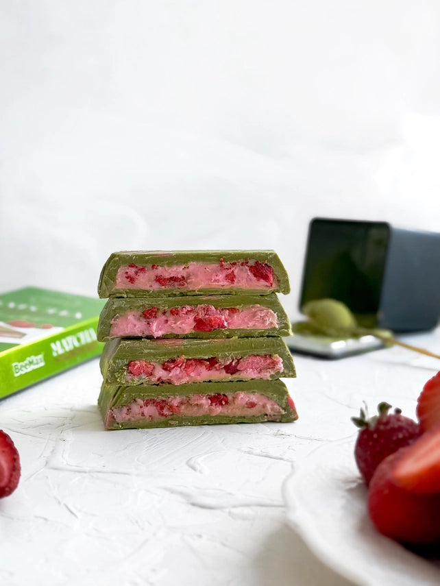 the candy bar cut in half on a decorated table