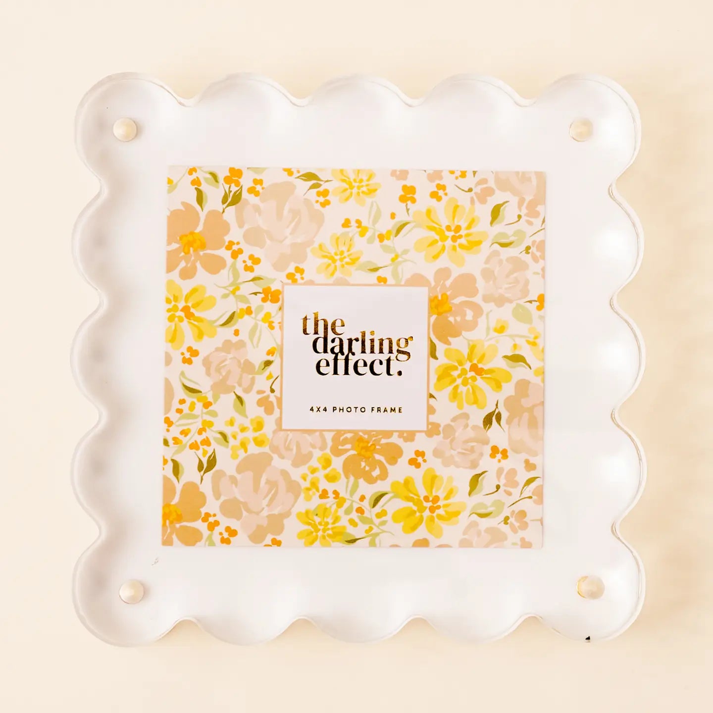 white Square Acrylic Frame with floral paper inside shown on a beige background