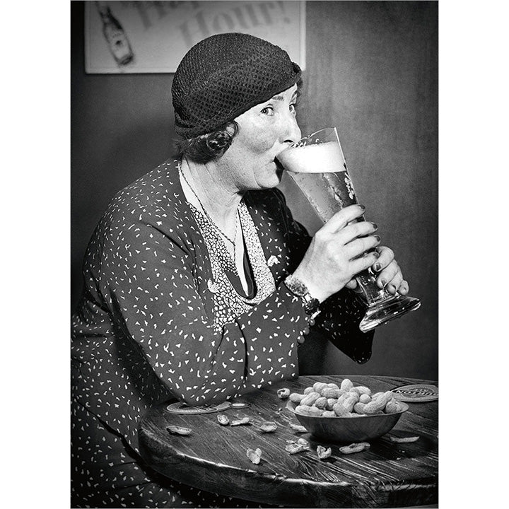front of card is black and white old fashioned mother drinking a tall beer