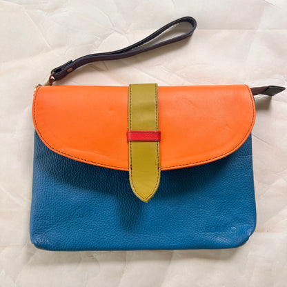 saddle bag with wristlet strap attached.