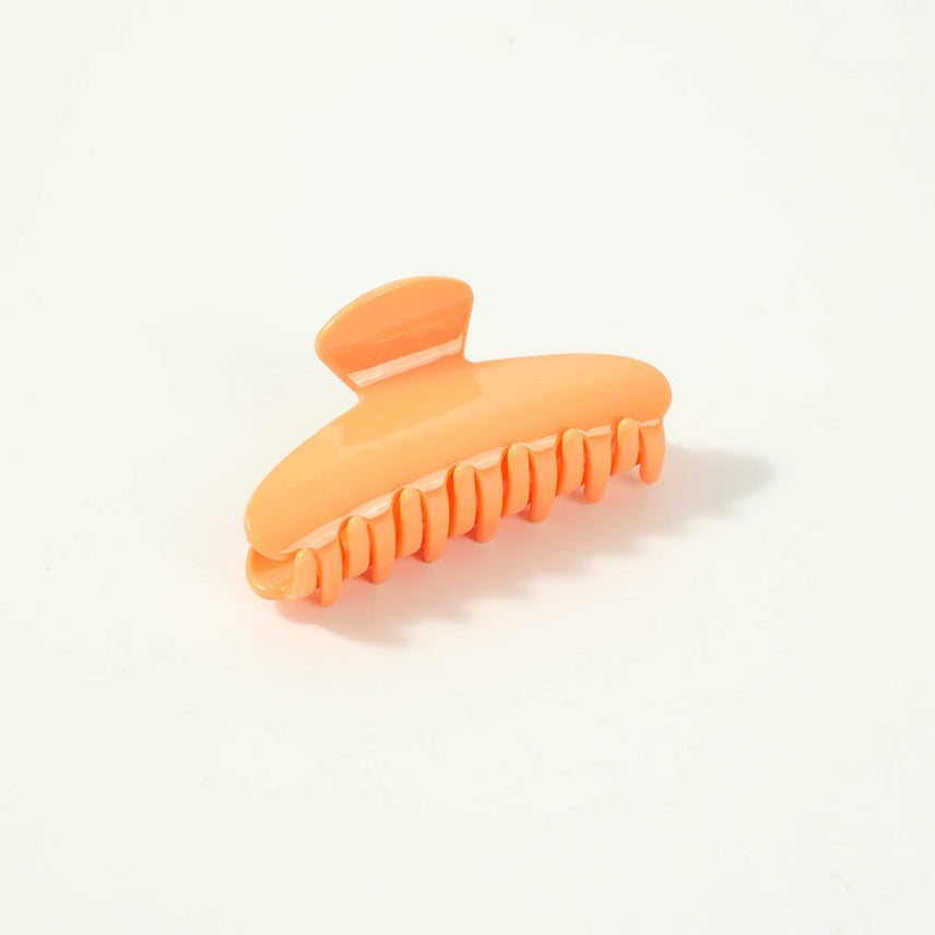 Pale Orange Hair Claw Clip on a white background