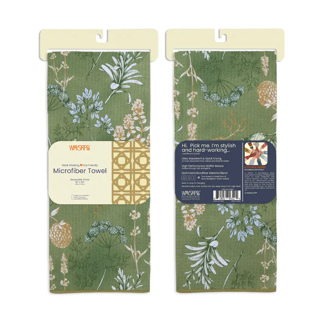 Front and back views of kitchen herbs dishtowels folded and in their card packaging.