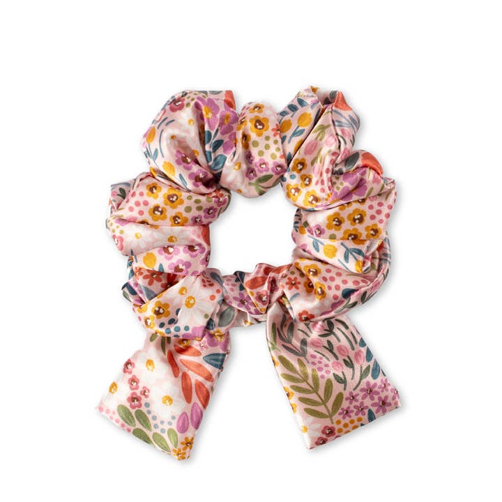 pale pink scrunchie with multi color floral design