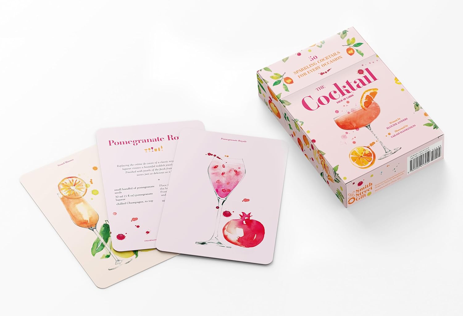 cocktail deck box with three cards laying out on white background