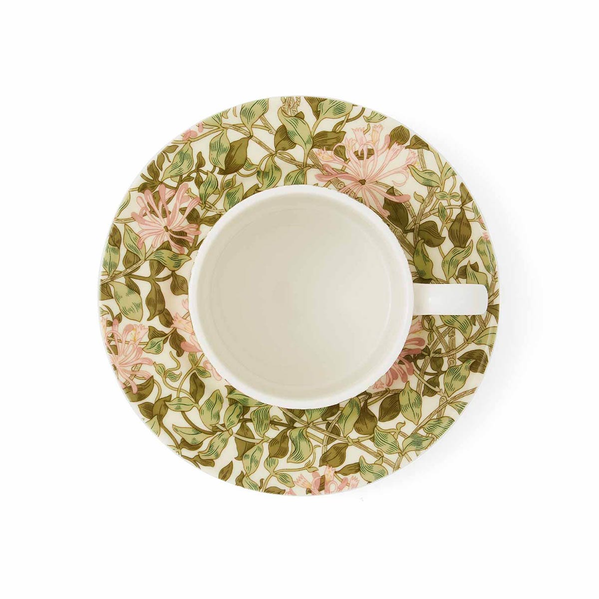 top down view of the honeysuckle teacup & saucer on a white background