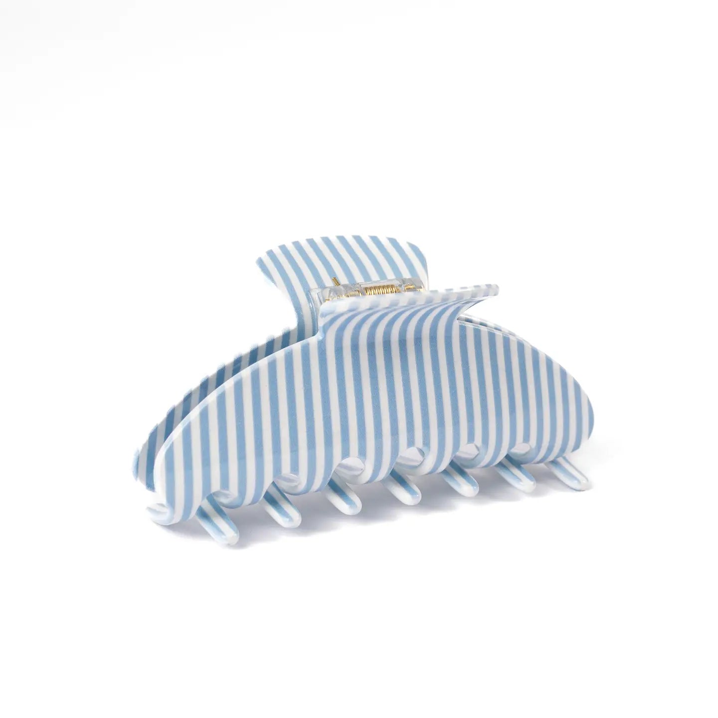 pale blue and white striped claw clip shown on a white background