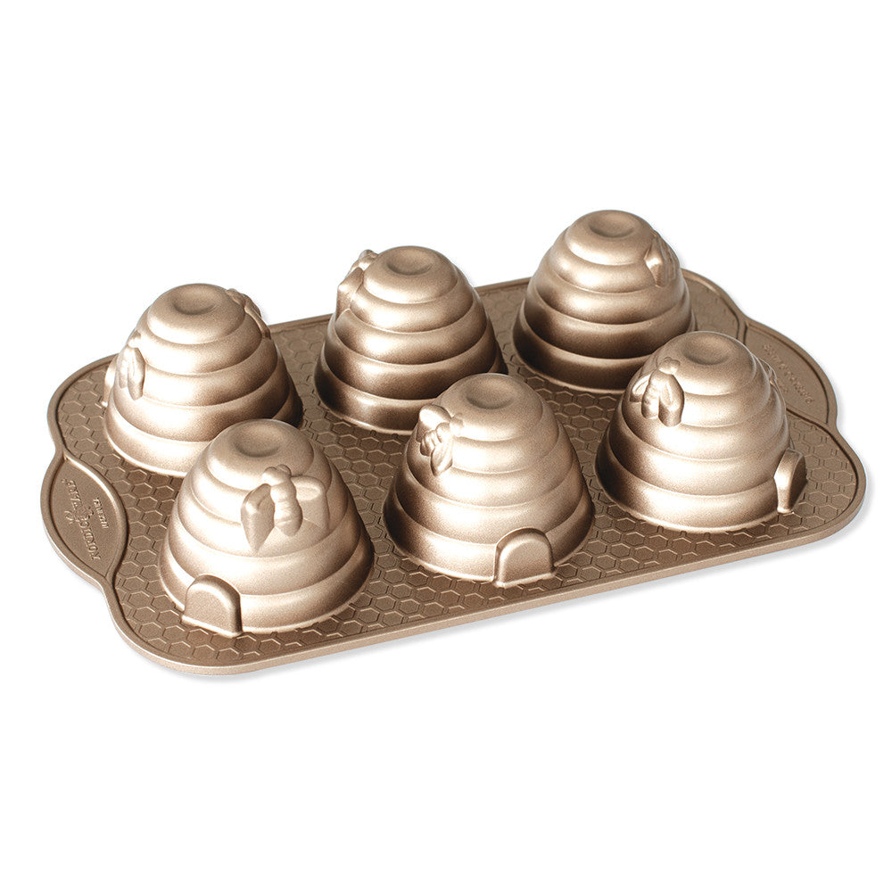 beehive cakelet pan with six spots displayed against a white background