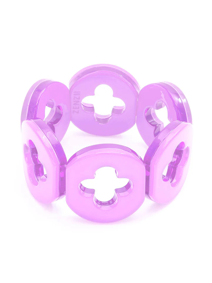 A lavender resin bracelet with a clover-shaped design on a white background.