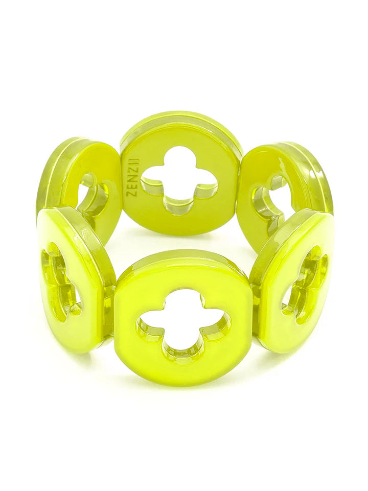 A lime yellow resin bracelet with a clover-shaped design on a white background.