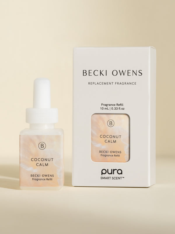 box of coconut calm and a vial of coconut calm fragrance vial on a beige background.