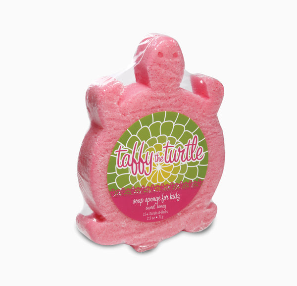 pink soap sponge in the shape of a pink turtle shown on a white background