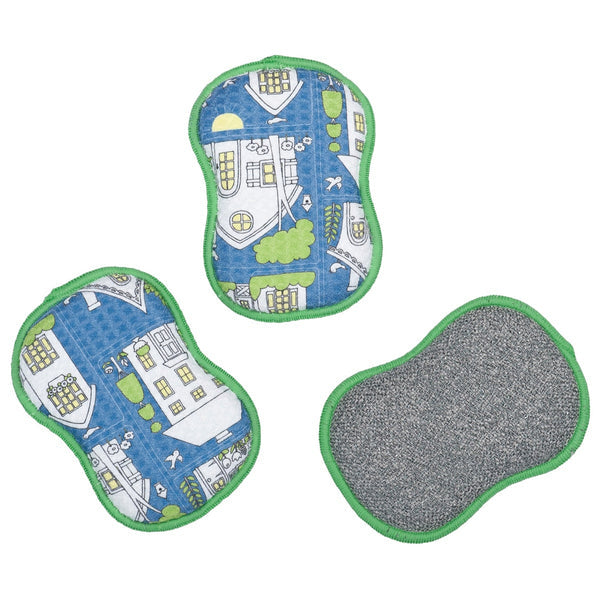 3 blue sponges with houses and trees printed on them