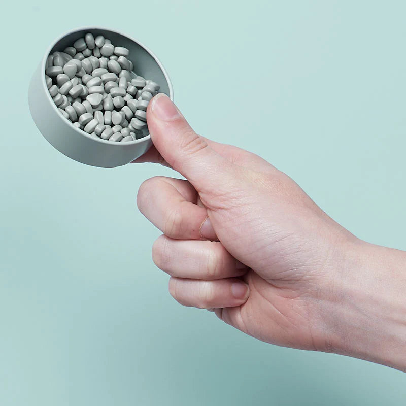 hand holding tin of sage crags