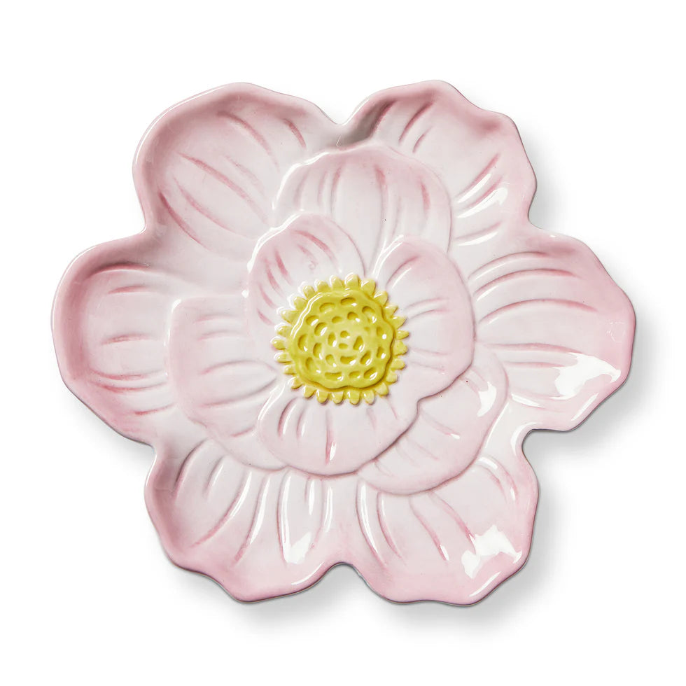 light pink flower shaped plate with yellow center