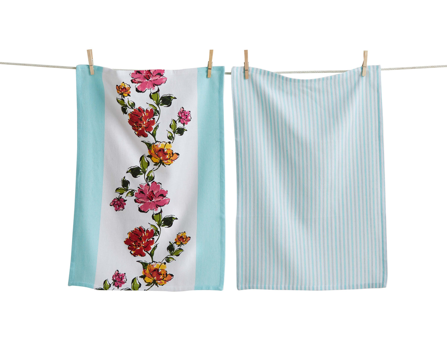 Two towels hanging on a line, one with floral design and the other with stripes.
