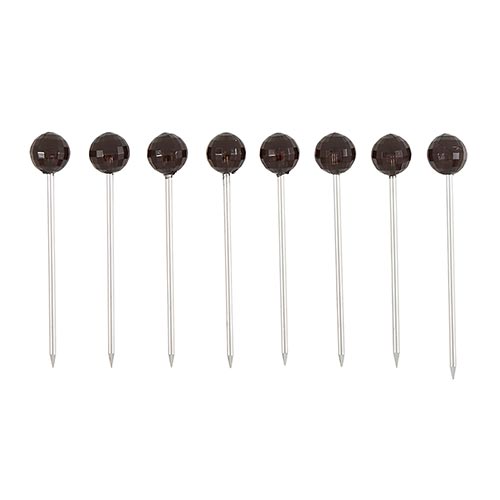 appetizer picks with black crystal heads in a row on a white background.