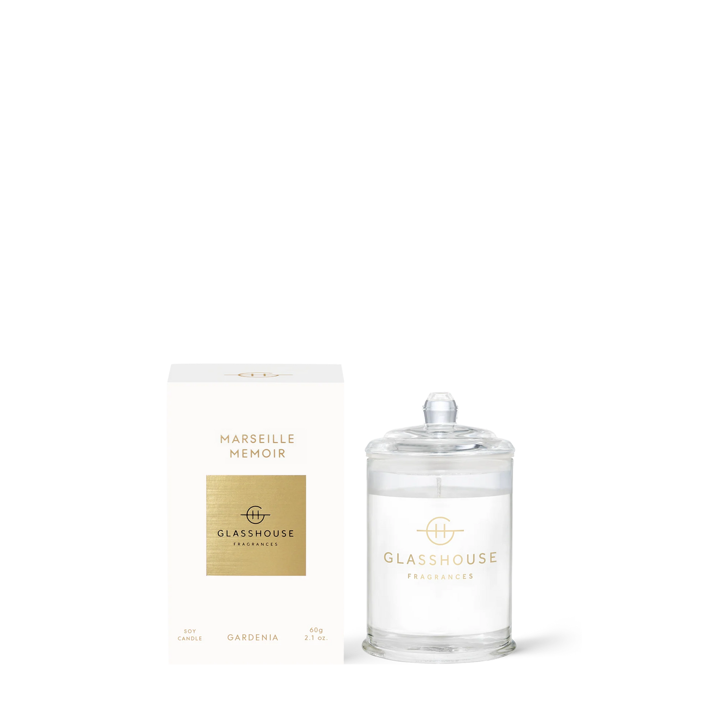Marseille Memoir small candle set next to its white box packaging.