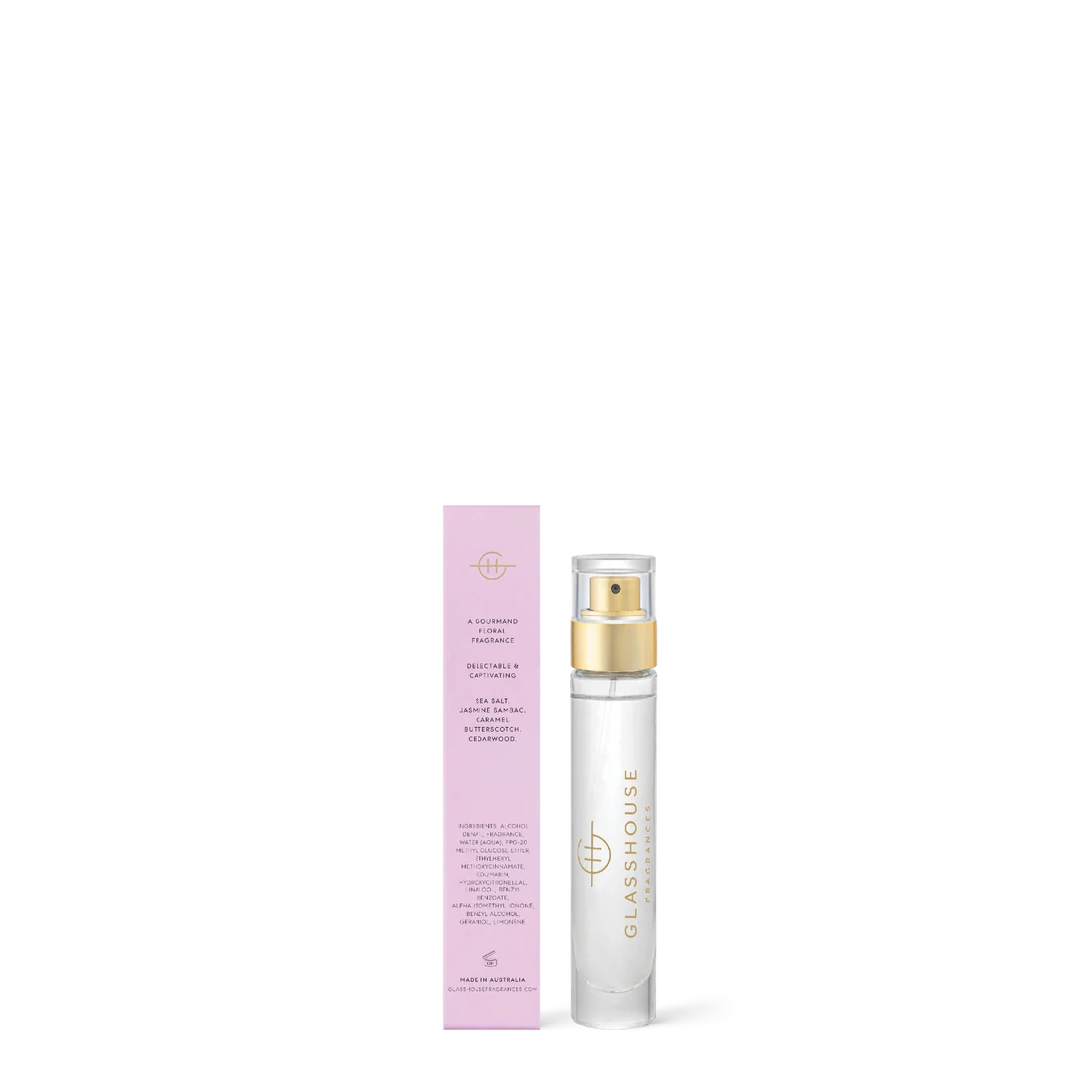 glass bottle of A Tahaa Affair Eau De Parfum set next to the back view of its pink box packaging